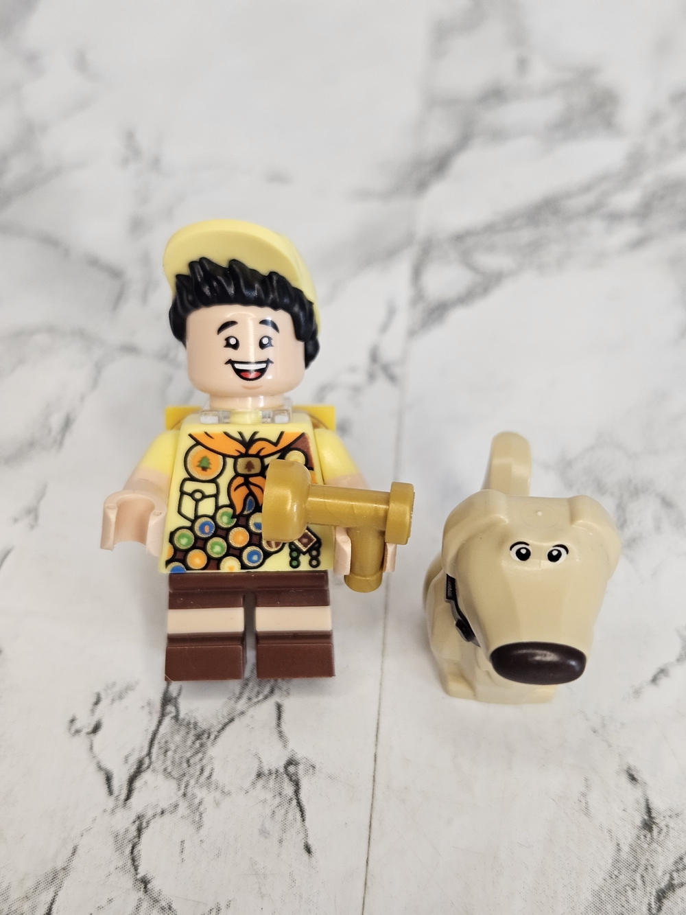 LEGO Russell and Dug minifigures from the Disney Pixar Up House set.